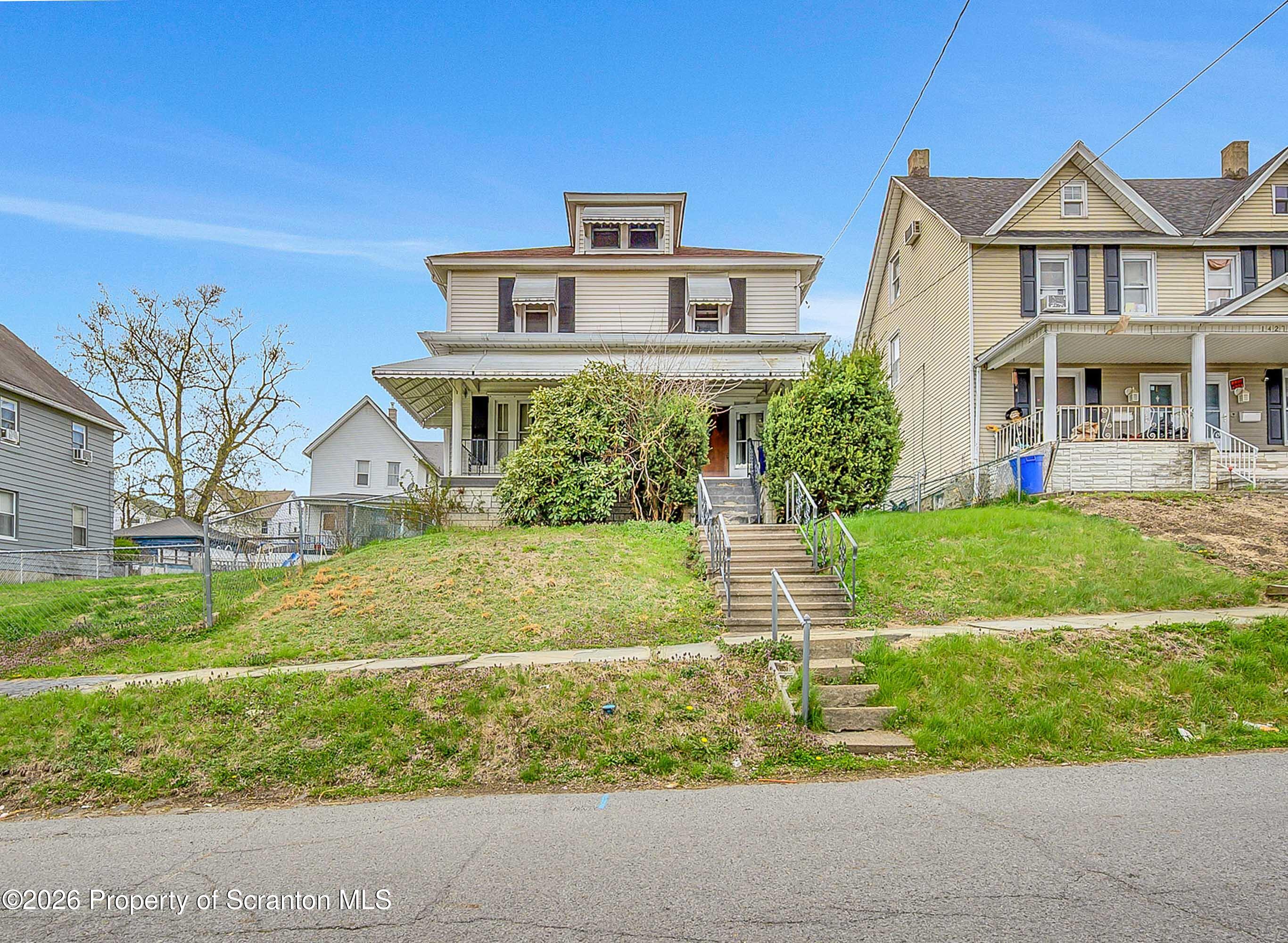 1425 Church Avenue Scranton, PA 18508 - Photo 21 of 21 a front view of a house with a yard
