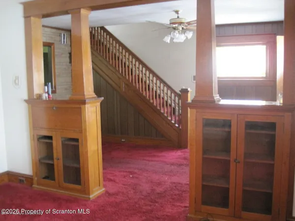 a view of a livingroom with a staircase