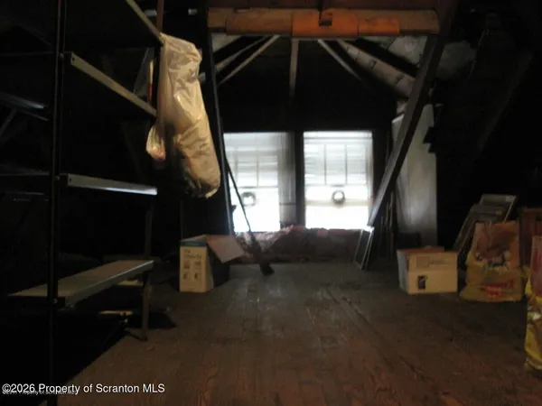 a kitchen with a sink a stove and cabinets