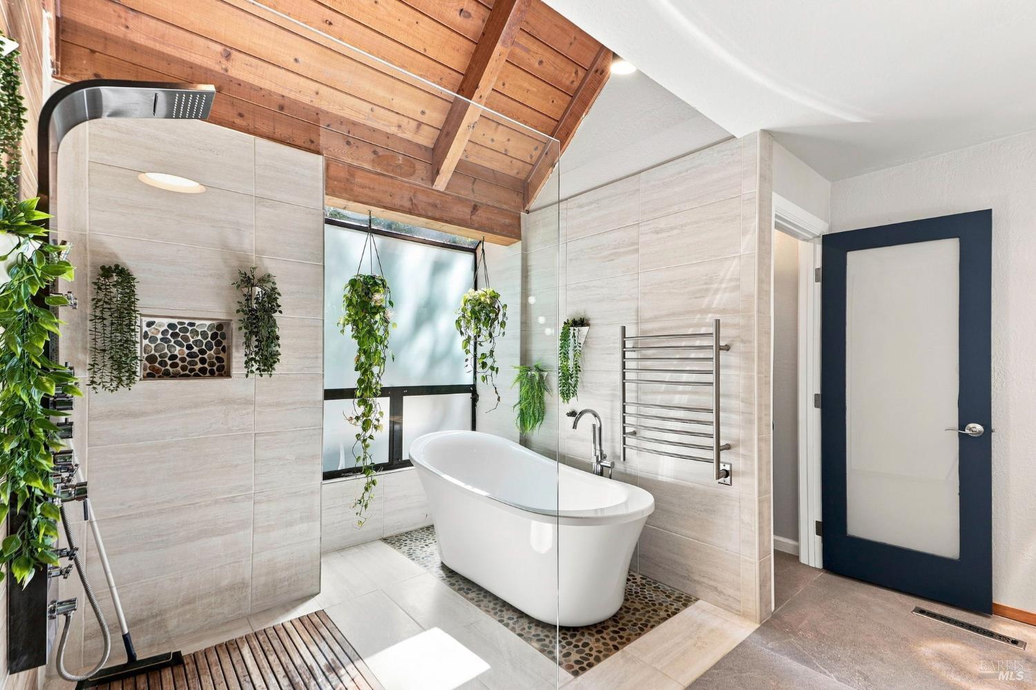 6485 Timber Springs Drive Santa Rosa, CA 95409 - Photo 34 of 67 Remodeled primary bathroom with heated floors, gorgeous shower, soaking tub, separate, private comode room and heated towel rack