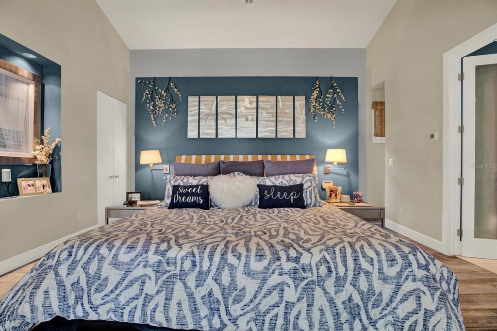 4541 School Road Land O' Lakes, FL 34638 - Photo 20 of 68 a bed sitting in a bedroom next to a window