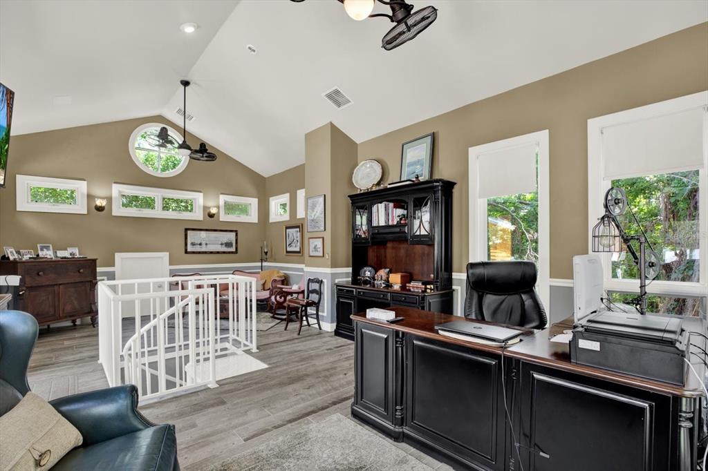 4541 School Road Land O' Lakes, FL 34638 - Photo 26 of 68 a living room with lots of furniture and a window