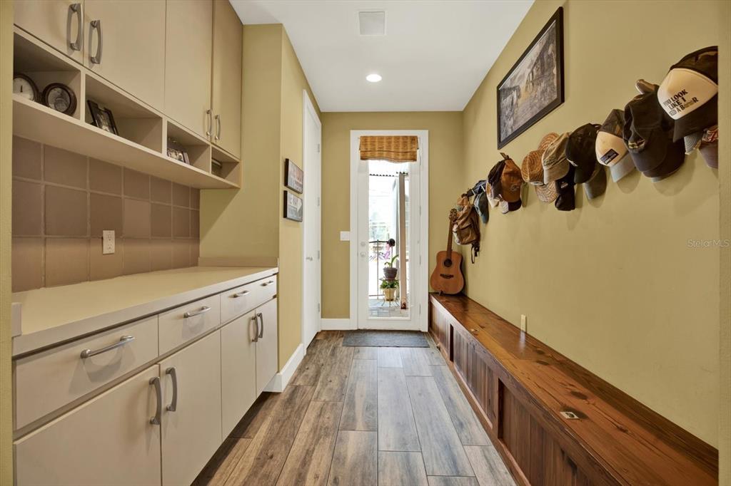 4541 School Road Land O' Lakes, FL 34638 - Photo 28 of 68 a hallway with cabinets