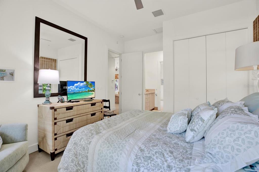 4541 School Road Land O' Lakes, FL 34638 - Photo 41 of 68 a bedroom with a bed and a flat screen tv