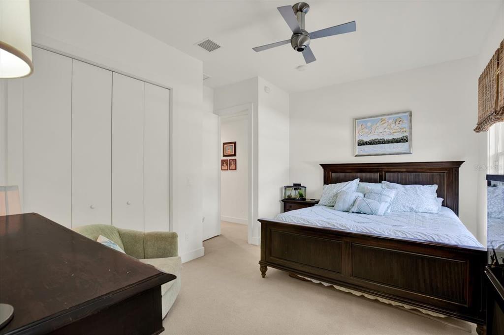 4541 School Road Land O' Lakes, FL 34638 - Photo 43 of 68 a bedroom with a bed and furniture