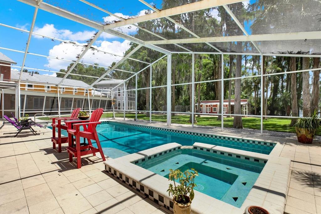 4541 School Road Land O' Lakes, FL 34638 - Photo 5 of 68 a view of a backyard with sitting area and furniture