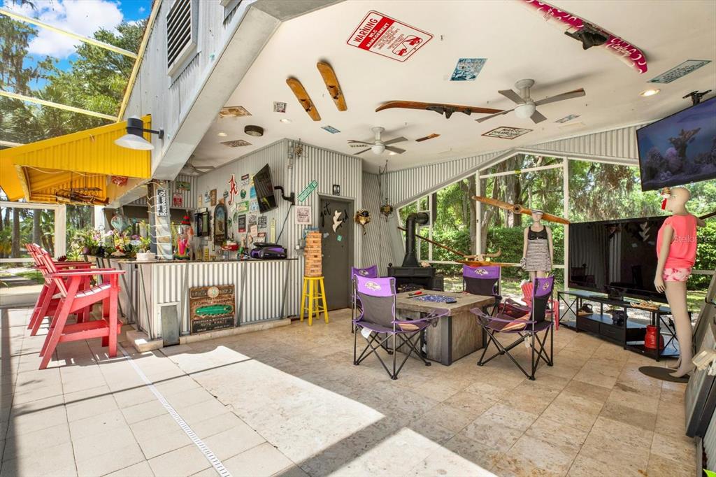 4541 School Road Land O' Lakes, FL 34638 - Photo 51 of 68 a outdoor space with lots of tables and chairs