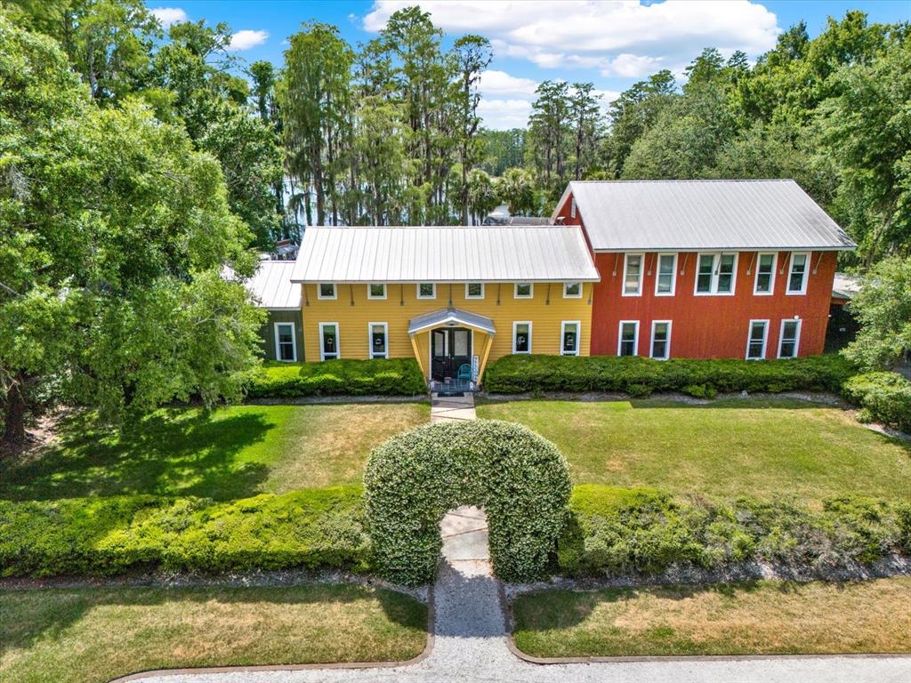 4541 School Road Land O' Lakes, FL 34638 - Photo 60 of 68 front view of a house with a yard
