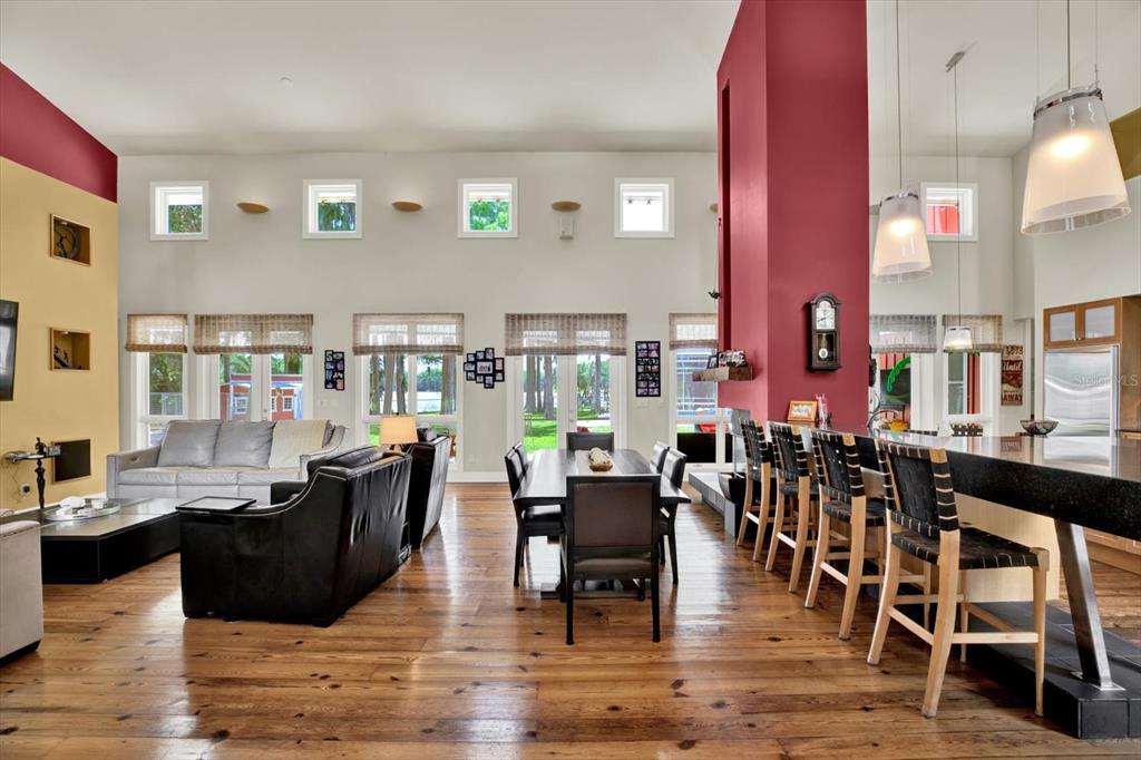 4541 School Road Land O' Lakes, FL 34638 - Photo 9 of 68 a living room with lots of furniture and wooden floor