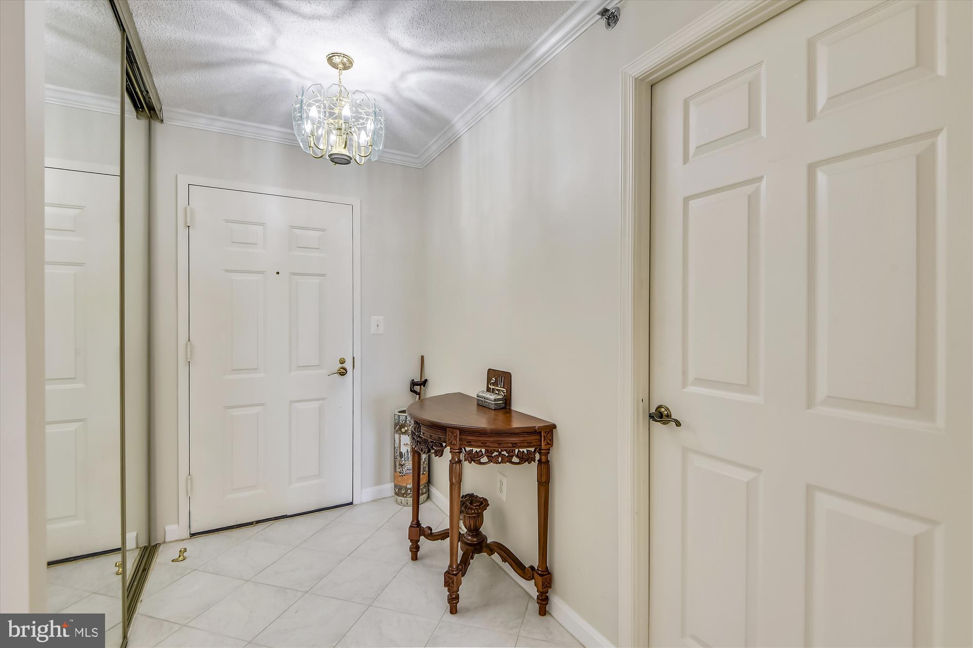 19385 Cypress Ridge Terrace, Unit 920 Leesburg, VA 20176 - Photo 2 of 42 a view of a hallway with a elevator