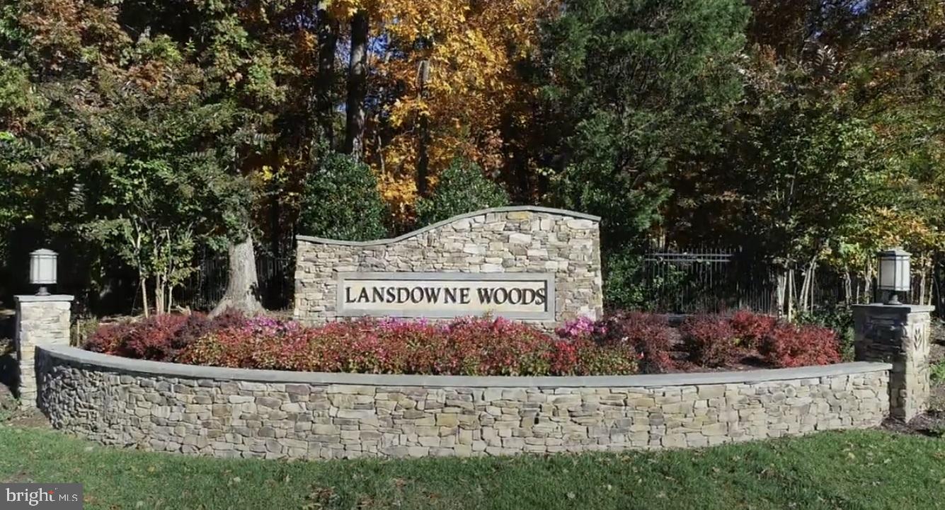 19385 Cypress Ridge Terrace, Unit 920 Leesburg, VA 20176 - Photo 23 of 42 a sign on the side of a building