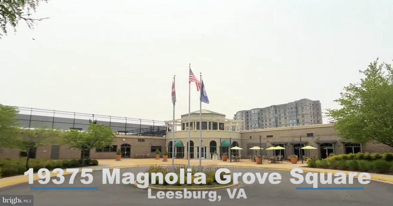 19385 Cypress Ridge Terrace, Unit 920 Leesburg, VA 20176 - Photo 26 of 42 a front view of a building with street view