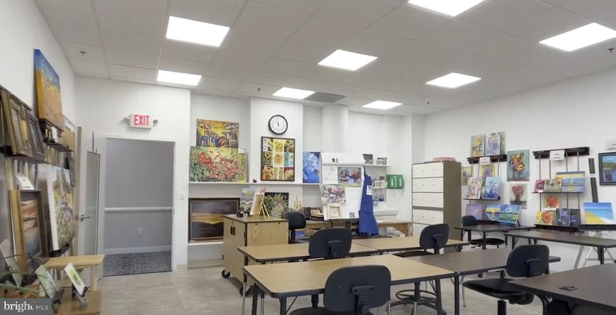 19385 Cypress Ridge Terrace, Unit 920 Leesburg, VA 20176 - Photo 31 of 42 a view of a dining room with furniture window and outside view