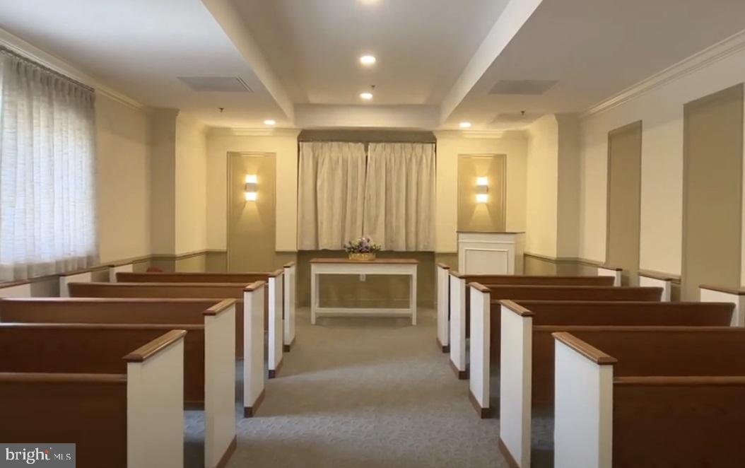 19385 Cypress Ridge Terrace, Unit 920 Leesburg, VA 20176 - Photo 33 of 42 a kitchen with a sink stove and cabinets
