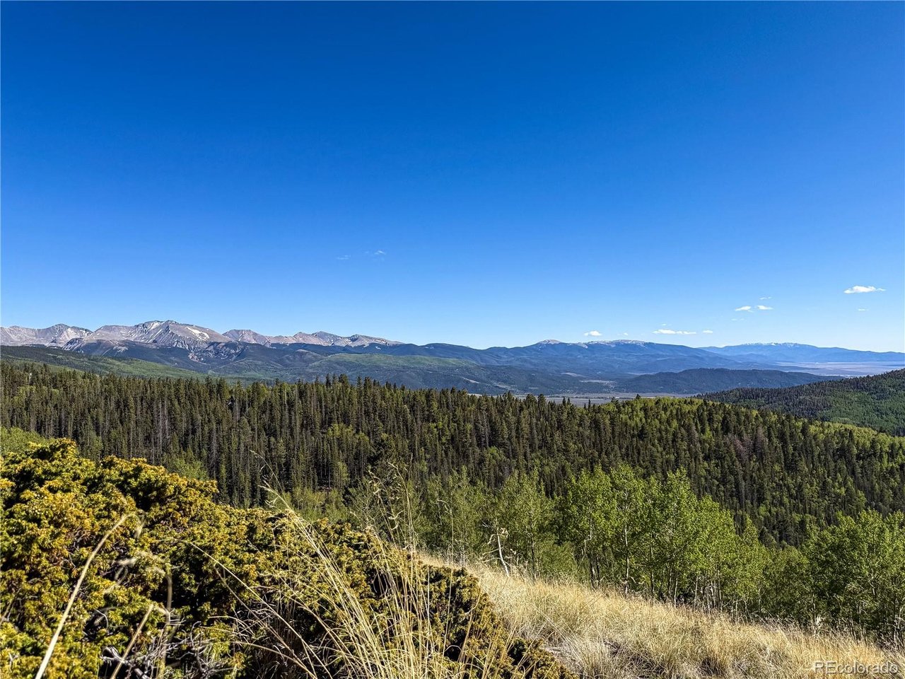6829 Ryland Road San Luis, CO 81152 - Photo 14 of 28 a view of a lake with mountains in the background
