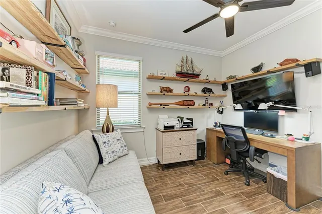 an aerial view of a house with a outdoor space
