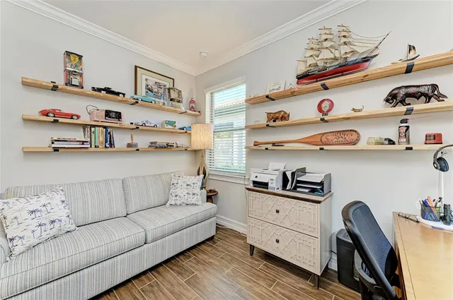 a view of a swimming pool with a lot of trees in the background
