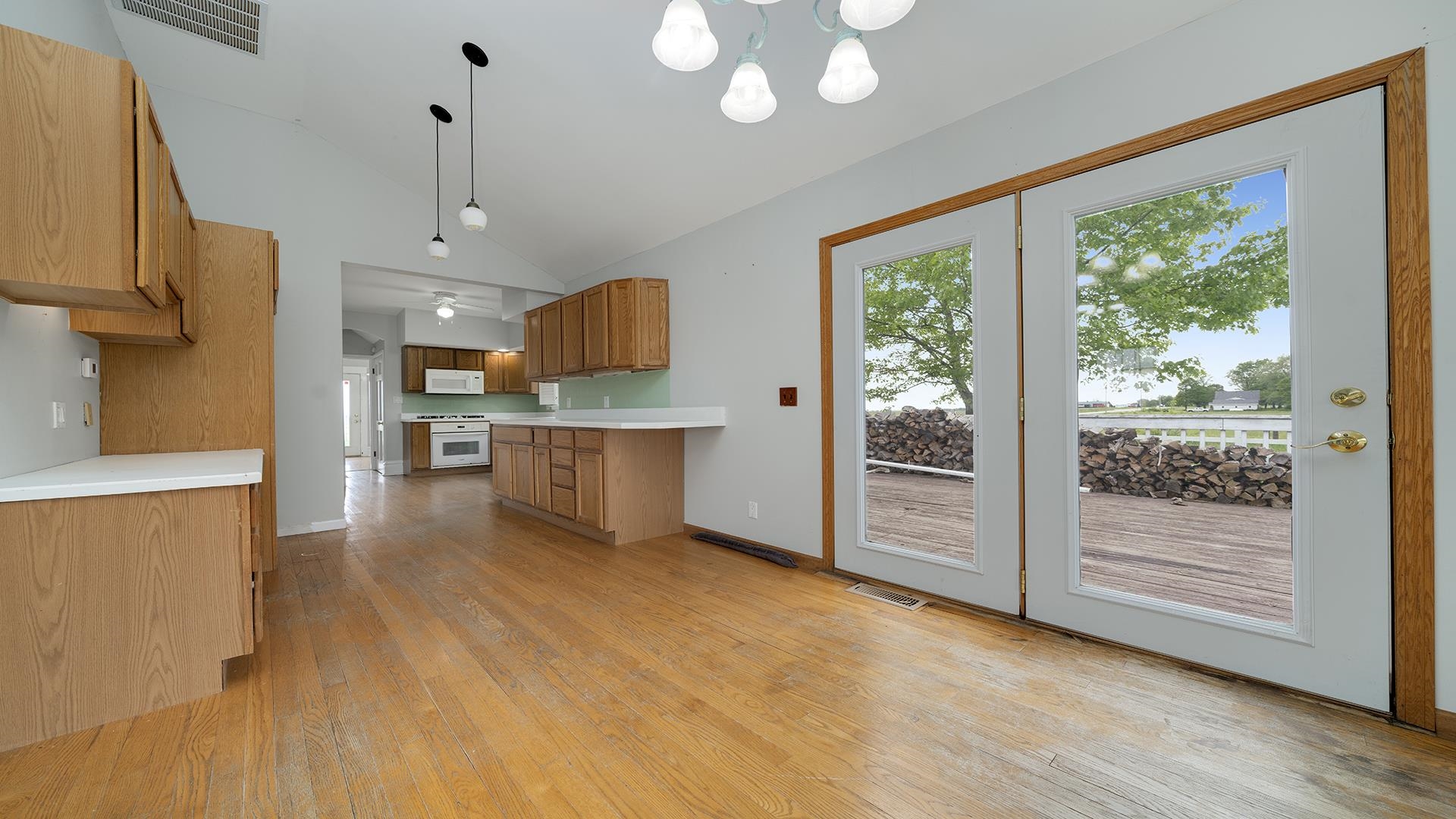 9020 East Flagg Road Rochelle, IL 61068 - Photo 11 of 61 a view of kitchen with furniture wooden floor and window