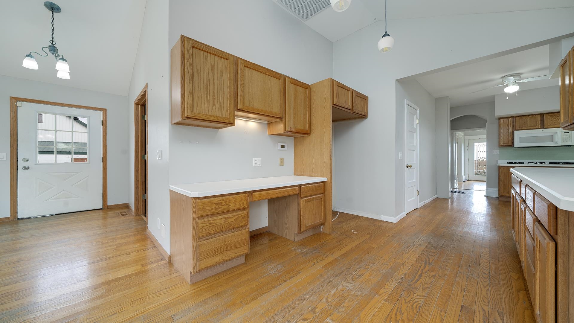 9020 East Flagg Road Rochelle, IL 61068 - Photo 12 of 61 a kitchen with stainless steel appliances granite countertop a refrigerator a stove and a wooden floors