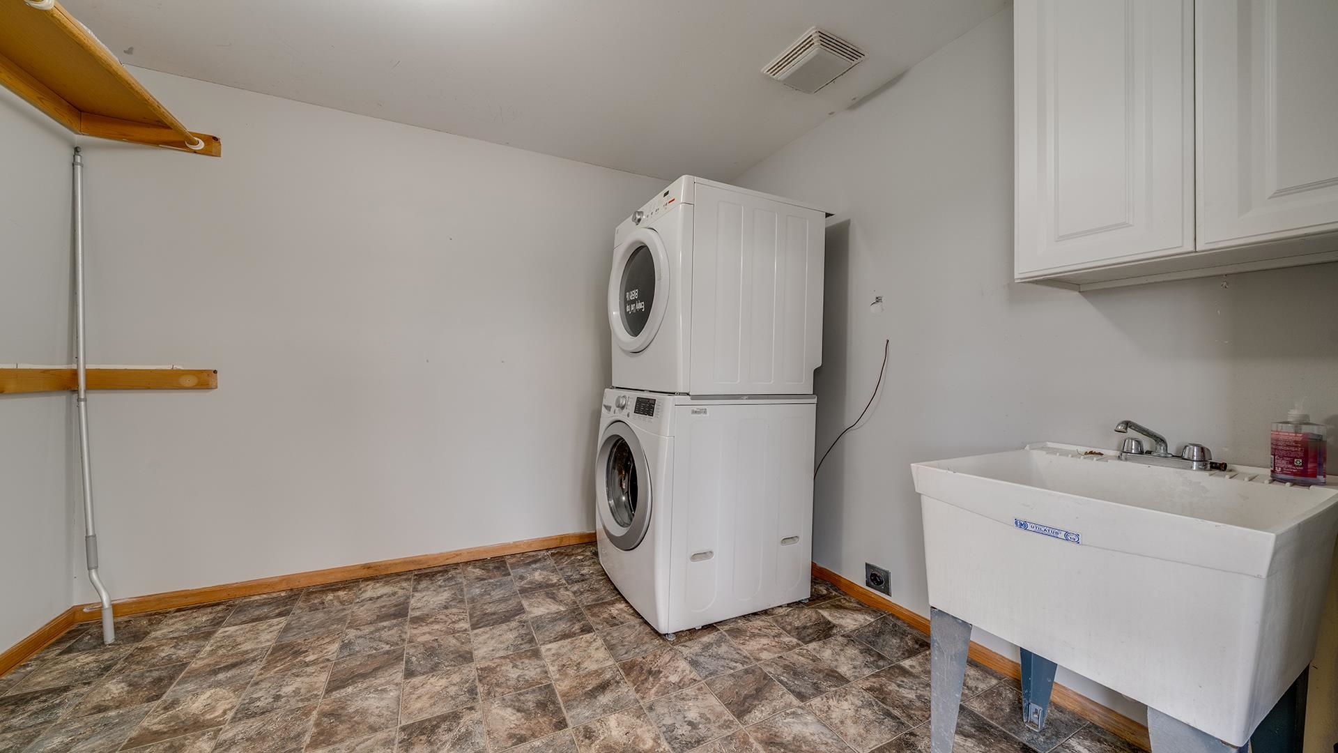 9020 East Flagg Road Rochelle, IL 61068 - Photo 16 of 61 a view of storage utility room with washer and dryer