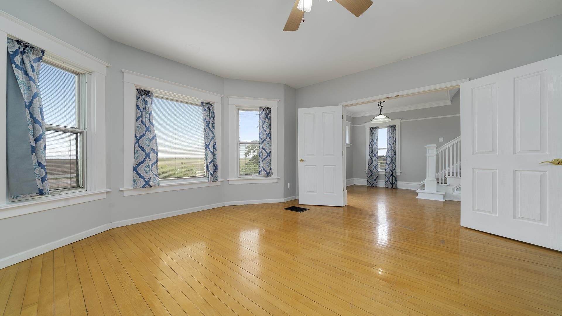 9020 East Flagg Road Rochelle, IL 61068 - Photo 22 of 61 wooden floor in an empty room with a window