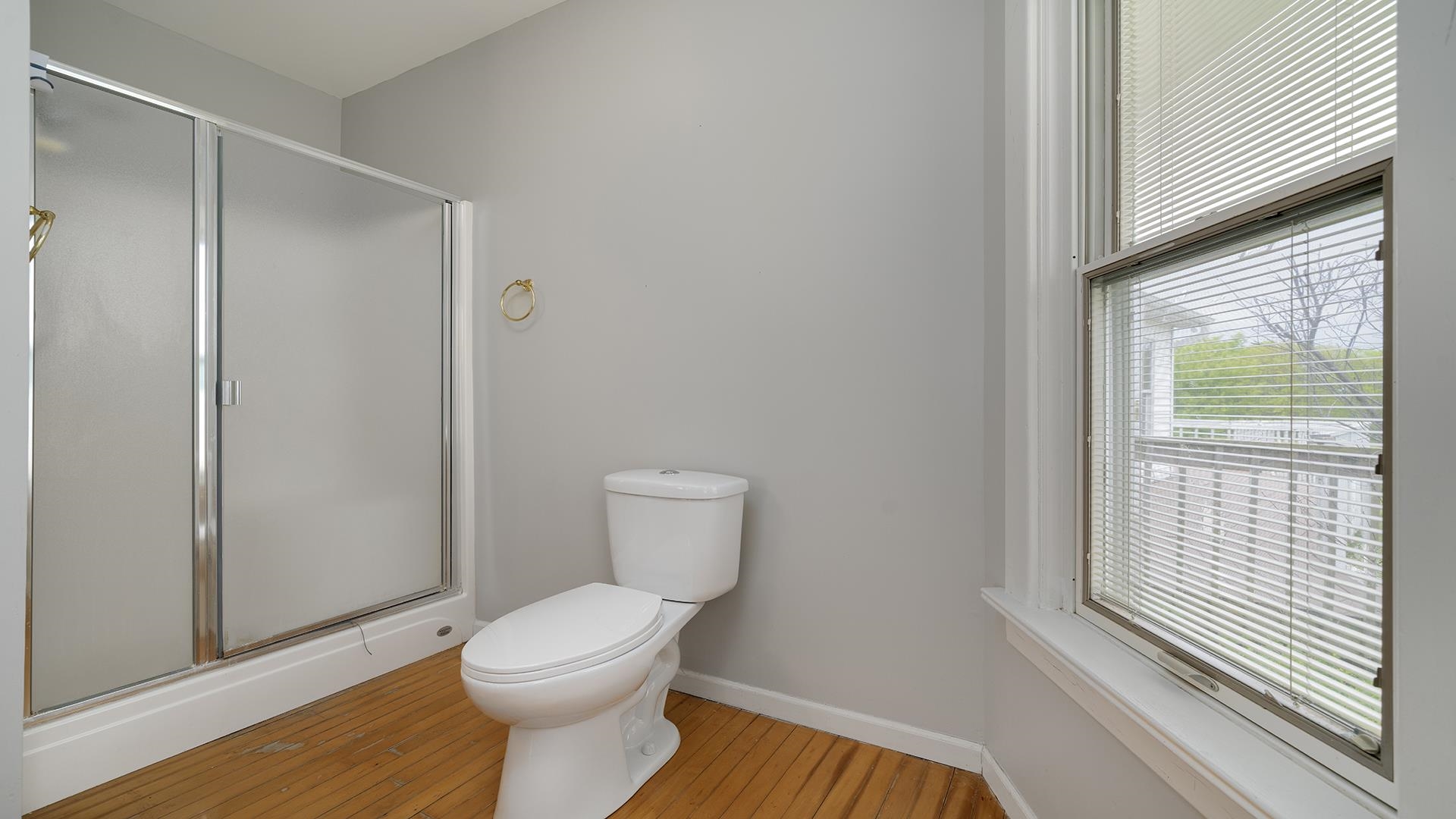 9020 East Flagg Road Rochelle, IL 61068 - Photo 25 of 61 a bathroom with a toilet and a shower