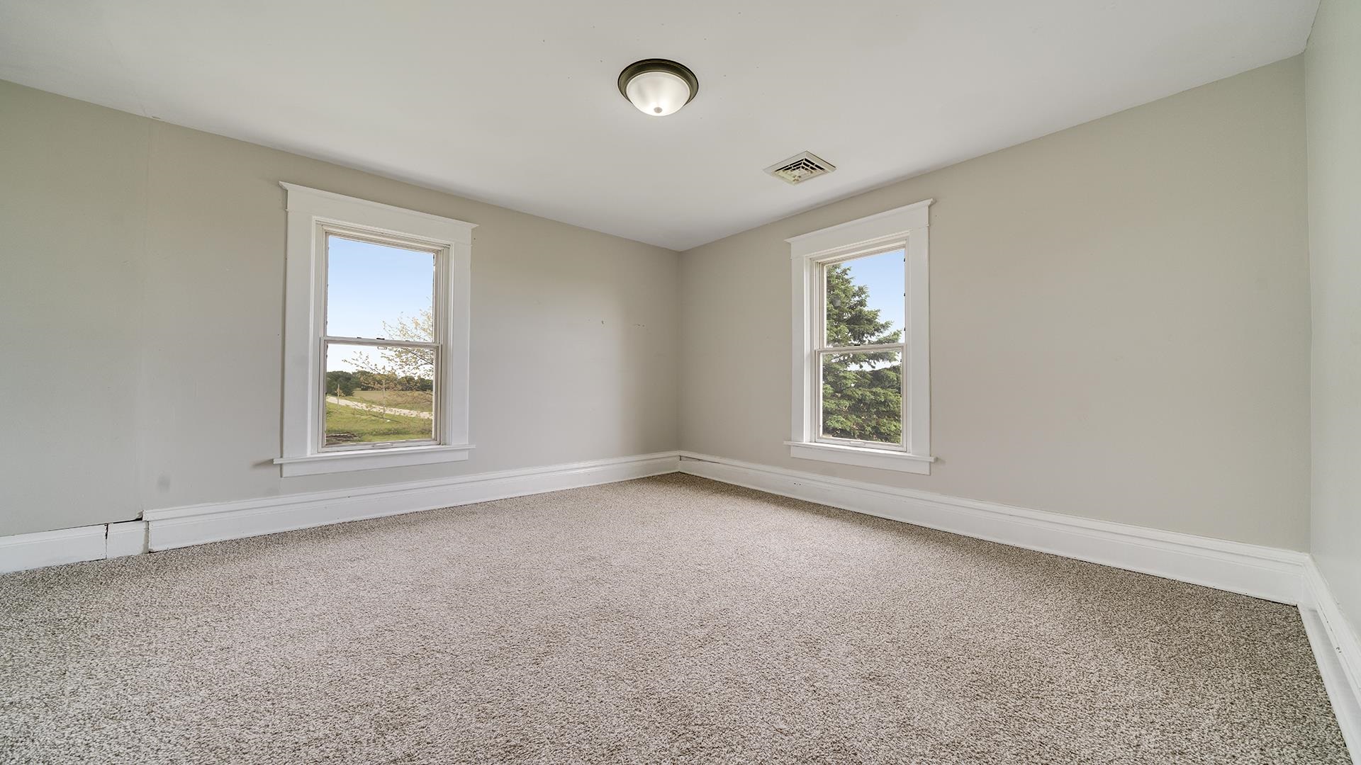 9020 East Flagg Road Rochelle, IL 61068 - Photo 29 of 61 an empty room with a window