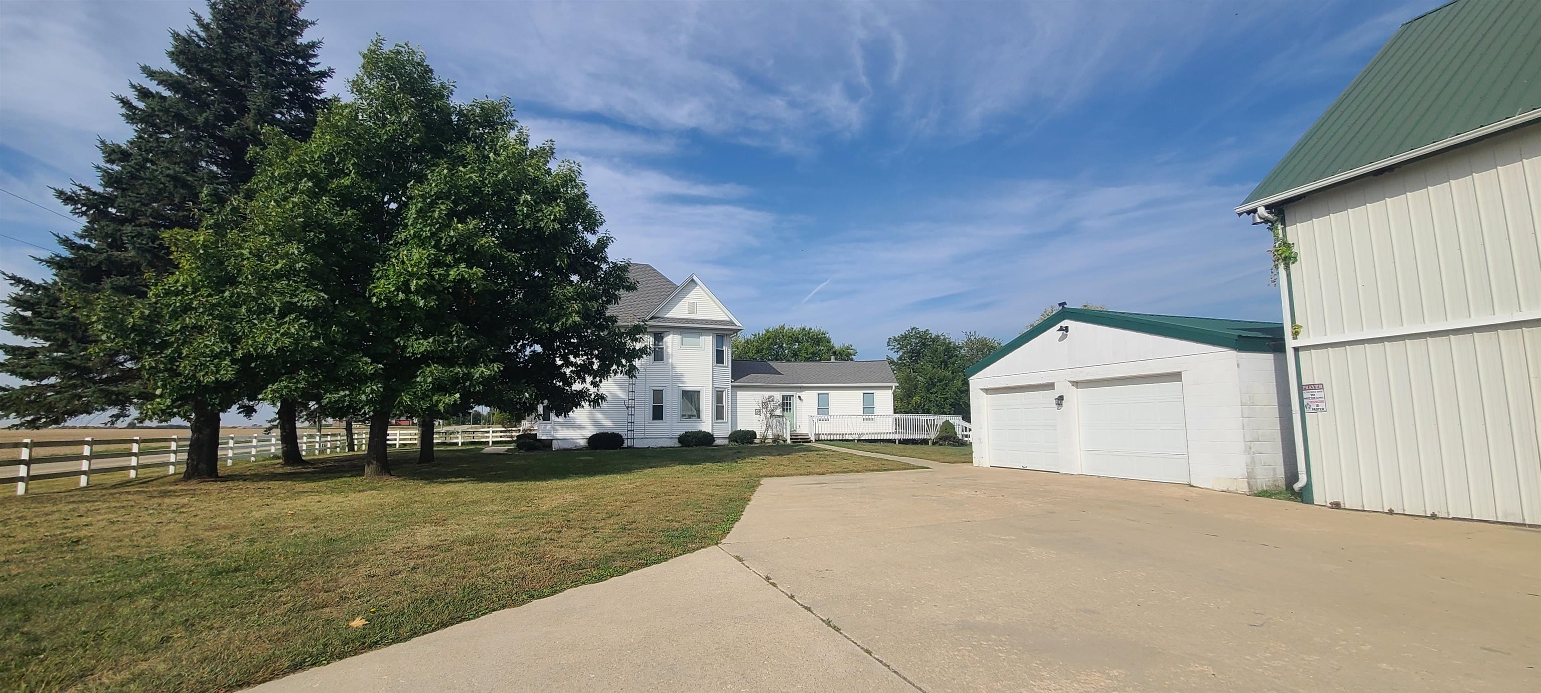 9020 East Flagg Road Rochelle, IL 61068 - Photo 3 of 61 a view of house with outdoor space and tree s