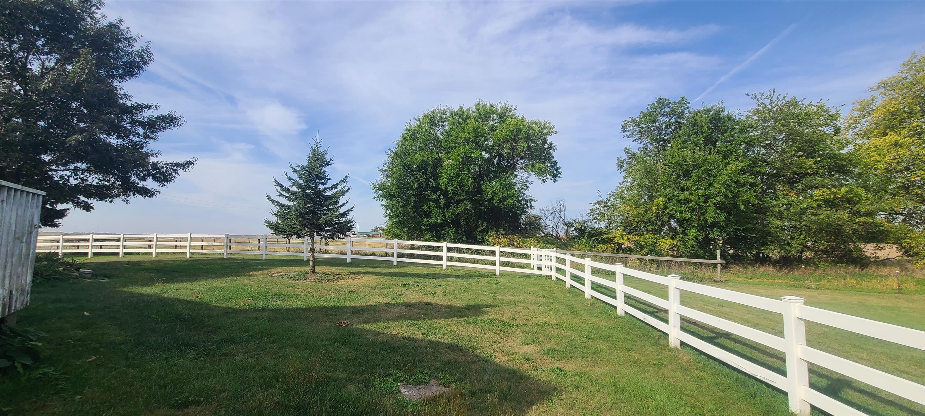 9020 East Flagg Road Rochelle, IL 61068 - Photo 59 of 61 a view of a golf course with a lake view
