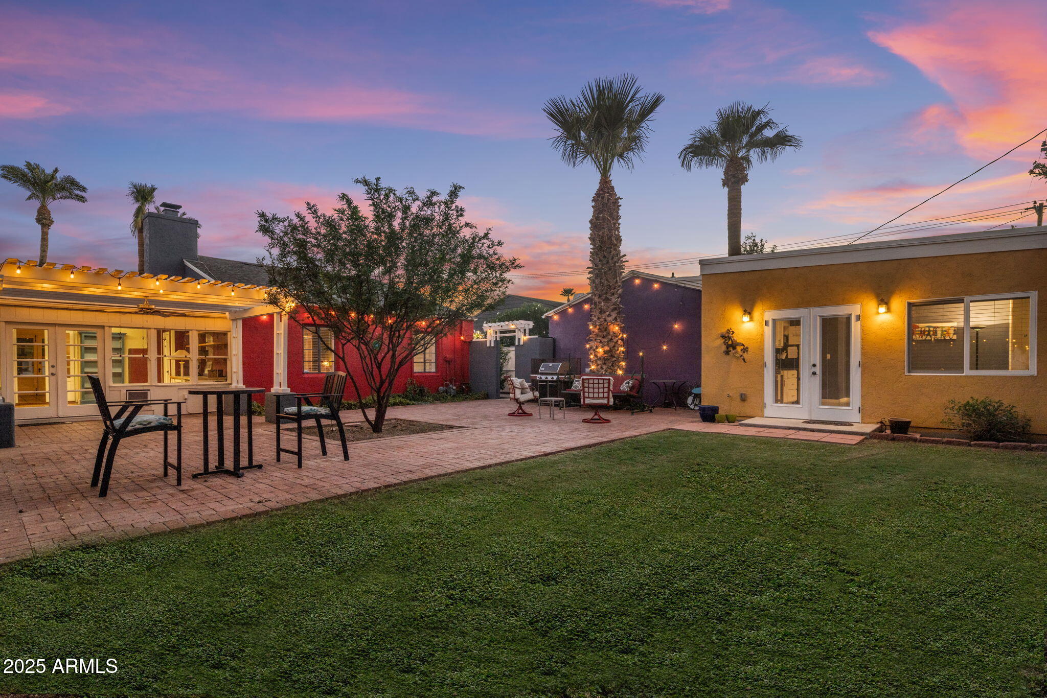 136 West Granada Road Phoenix, AZ 85003 - Photo 25 of 57 a view of a chairs and table in backyard