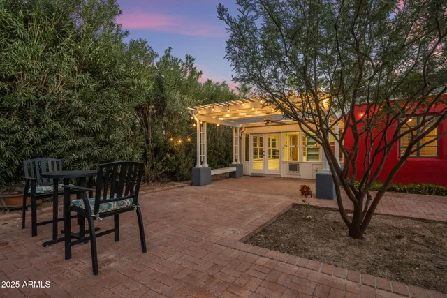 a kitchen with stainless steel appliances a refrigerator sink and cabinets