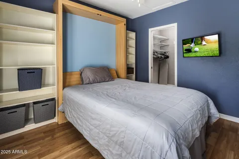 a view of a chairs and table in the patio