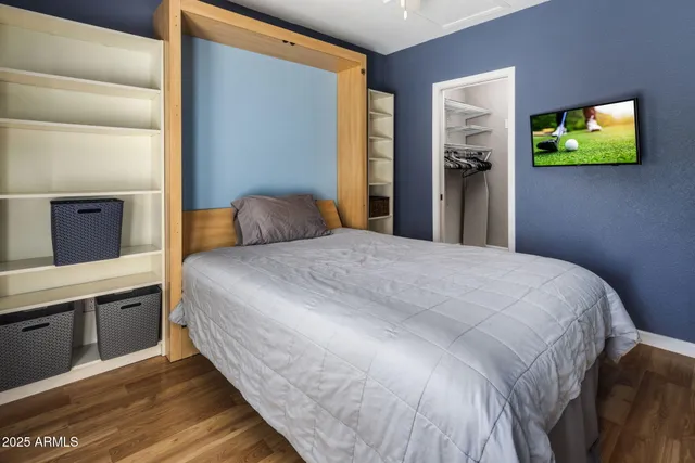 a view of a chairs and table in the patio