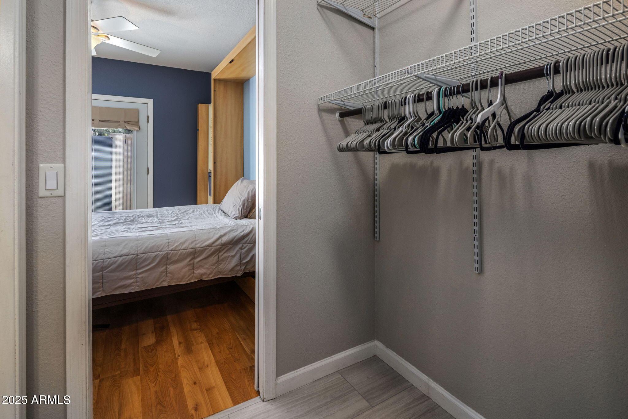 136 West Granada Road Phoenix, AZ 85003 - Photo 39 of 57 a bedroom with a bed and a window