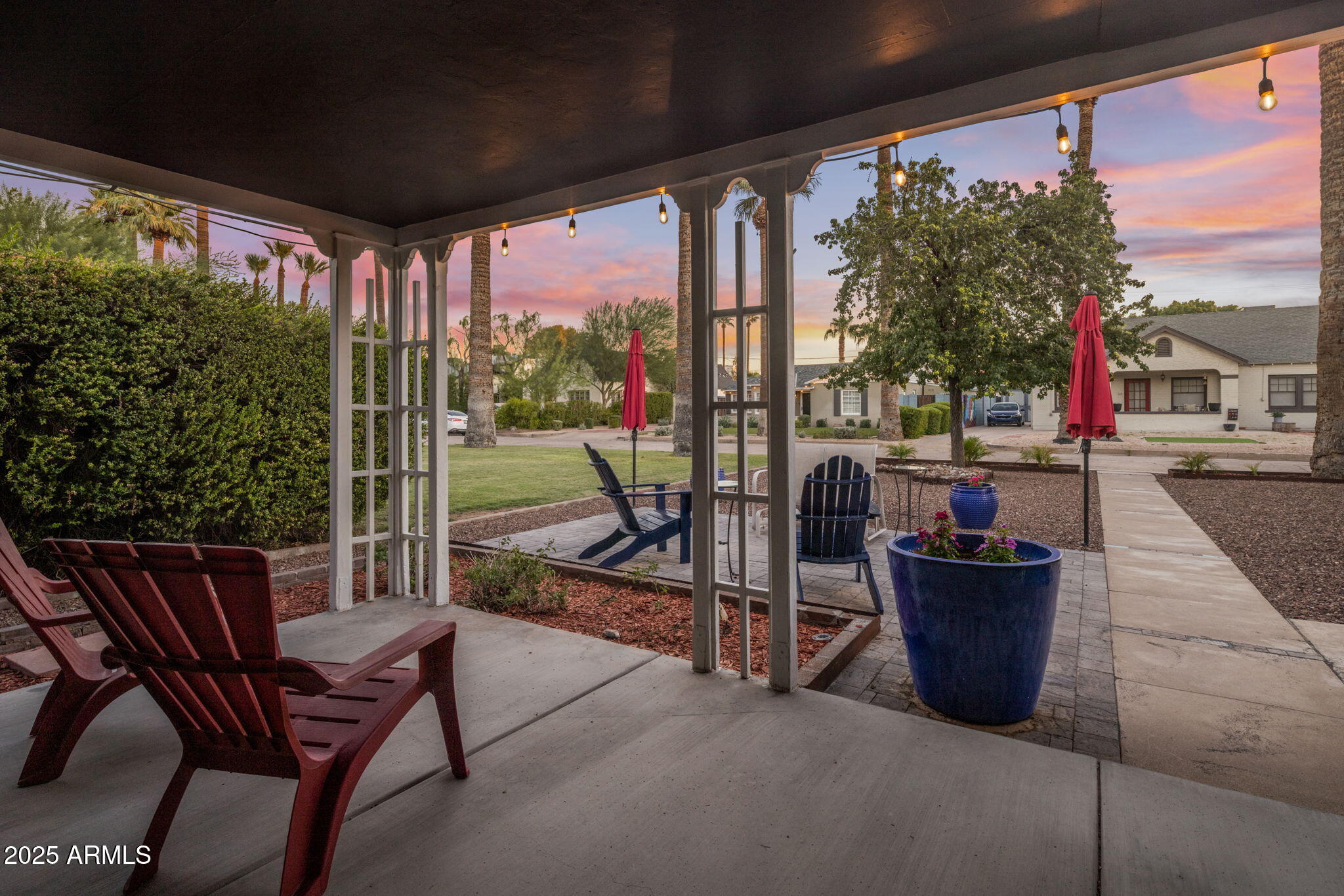 136 West Granada Road Phoenix, AZ 85003 - Photo 3 of 57 a view of a porch with chairs and backyard