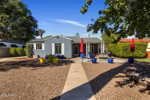 a view of a house with basketball court