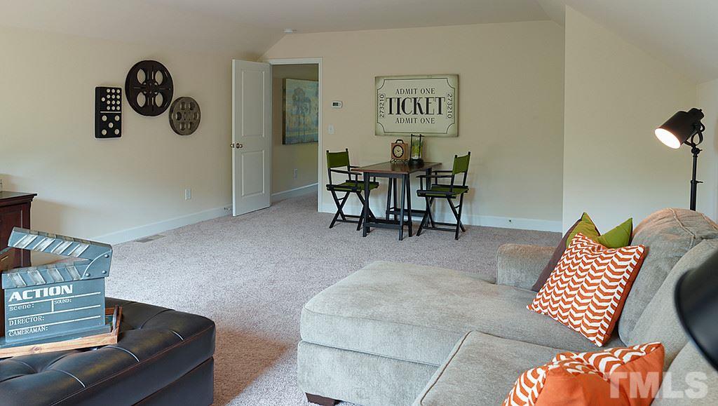 7402 Randshire Way Raleigh, NC 27616 - Photo 5 of 25 Completed Coastal E--for illustration purposes only, home listed is a Coastal E but will vary with ext. colors & interior appts. Furnishings & knick knacks not included in sales price. This home is under construction & built on a crawl space.