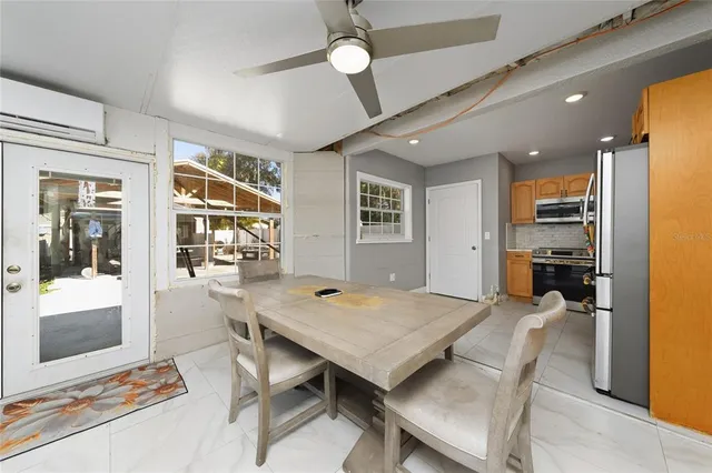 a view of a dining room with furniture
