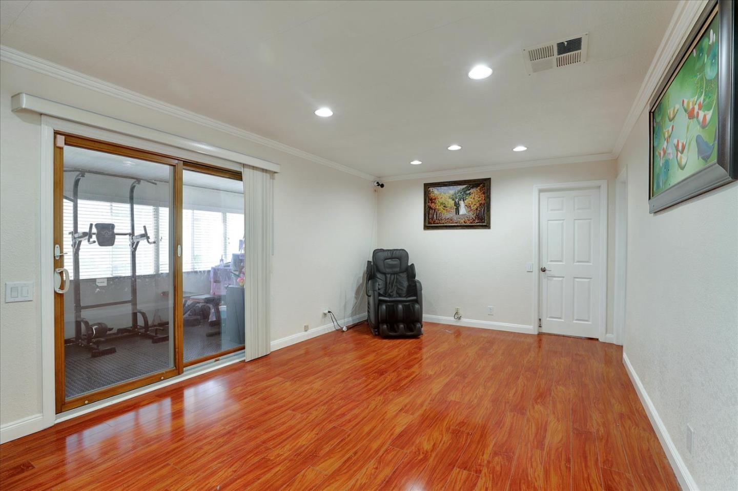 5450 Monterey Road, Unit 168 San Jose, CA 95111 - Photo 14 of 56 a bedroom with a bed and a flat screen tv