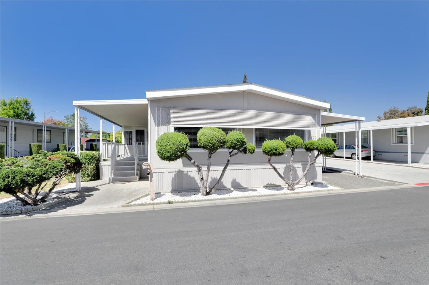 5450 Monterey Road, Unit 168 San Jose, CA 95111 - Photo 2 of 56 a view of a house with a yard and plants