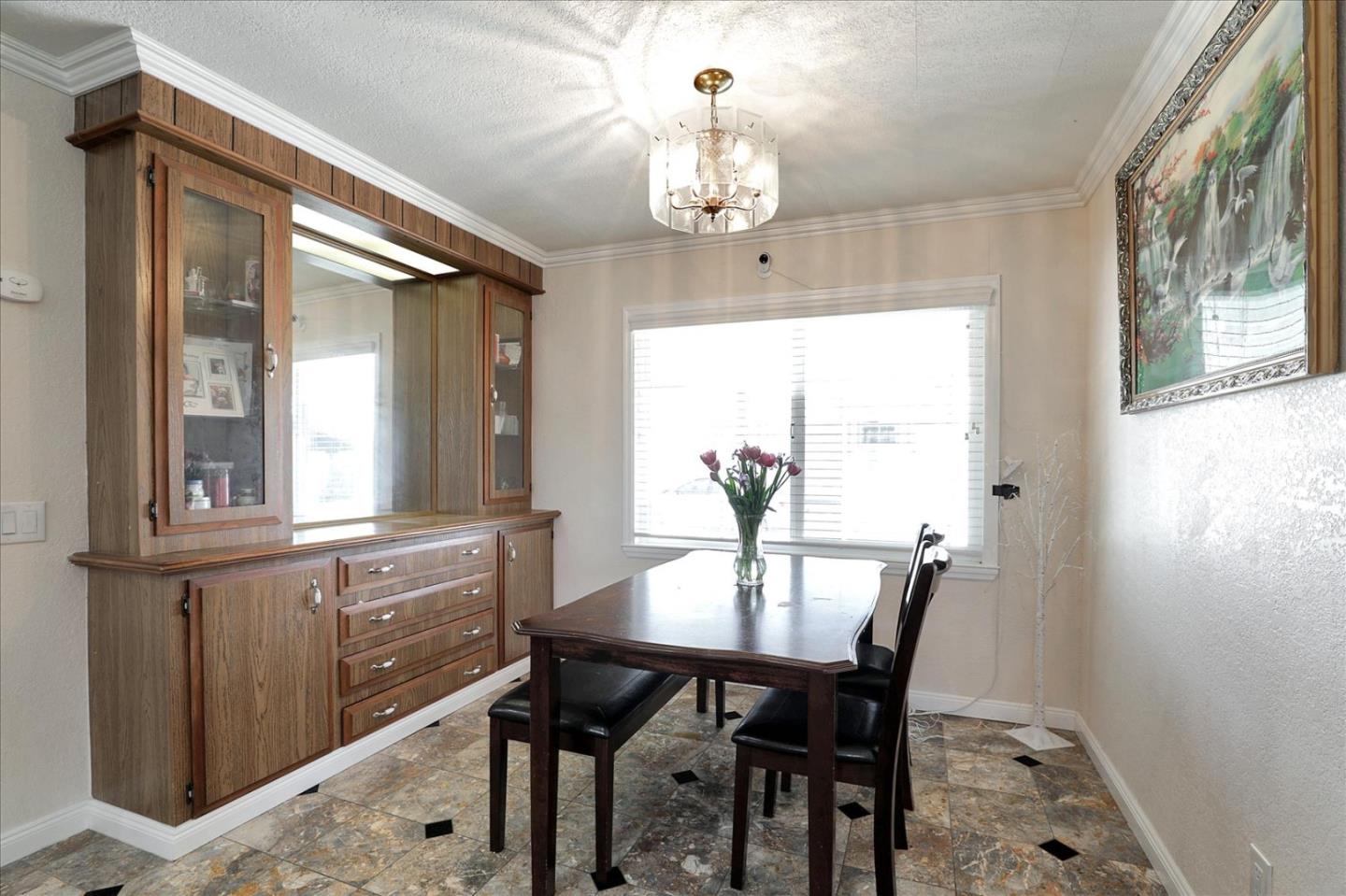 5450 Monterey Road, Unit 168 San Jose, CA 95111 - Photo 25 of 56 a view of a dining room with furniture and window