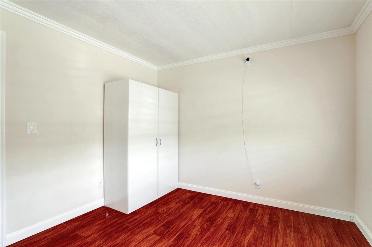 5450 Monterey Road, Unit 168 San Jose, CA 95111 - Photo 27 of 56 a view of room with window and wooden floor