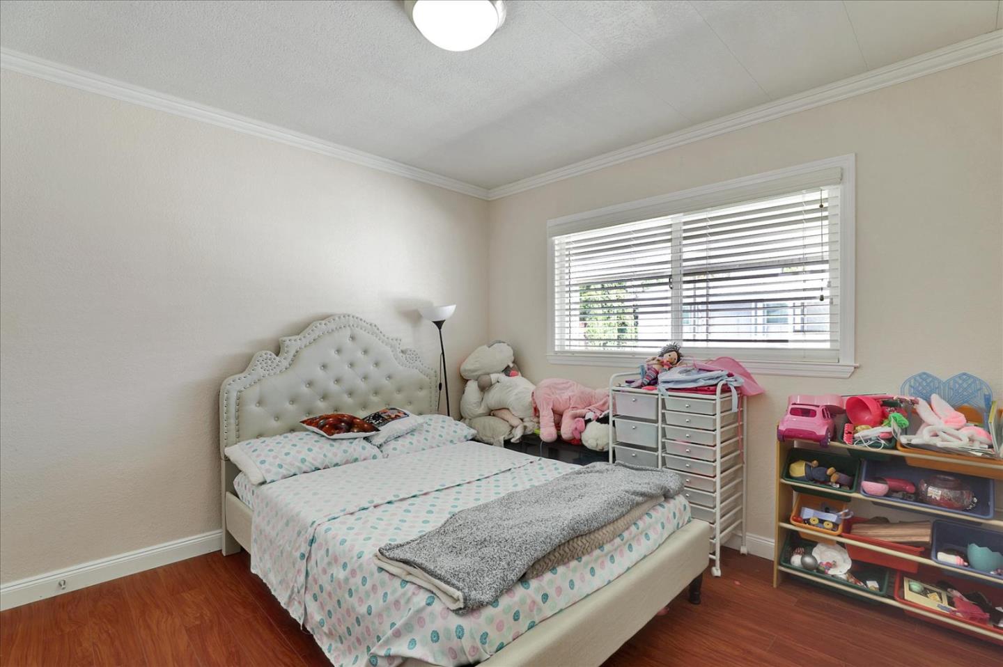 5450 Monterey Road, Unit 168 San Jose, CA 95111 - Photo 30 of 56 a bedroom with a bed and a window