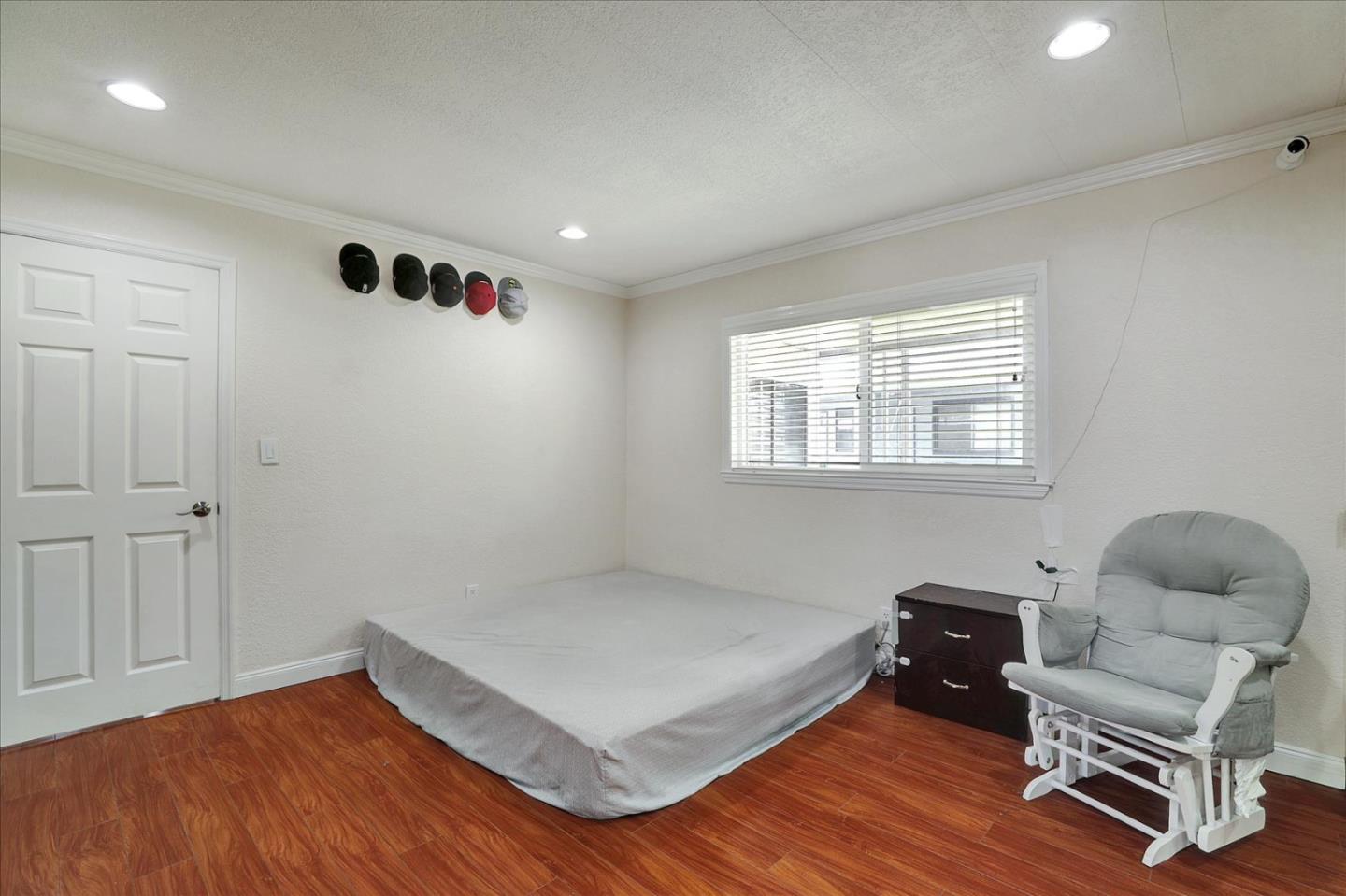 5450 Monterey Road, Unit 168 San Jose, CA 95111 - Photo 33 of 56 a living room with furniture and a window