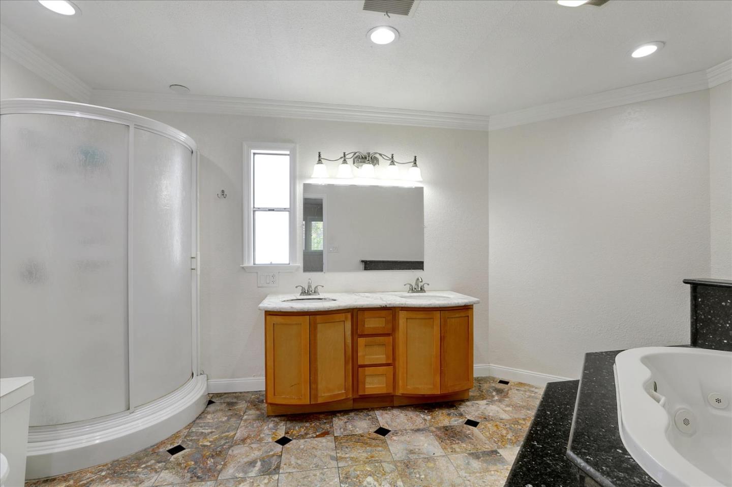 5450 Monterey Road, Unit 168 San Jose, CA 95111 - Photo 39 of 56 a bathroom with a sink a mirror and a bathtub