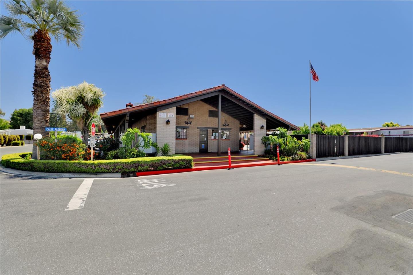 5450 Monterey Road, Unit 168 San Jose, CA 95111 - Photo 54 of 56 a front view of a house with a yard and potted plants