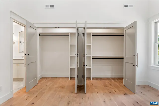 a view of an empty walk in closet