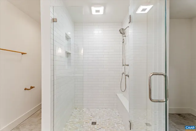a view of balcony with wooden floor and fence