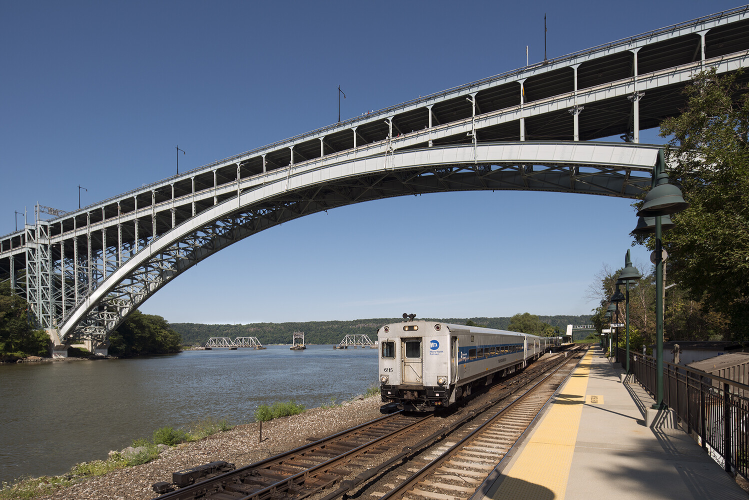 5800 Arlington Avenue, Unit 2R Bronx, NY 10471 - Photo 16 of 19 a view of a train that is sitting on the tracks