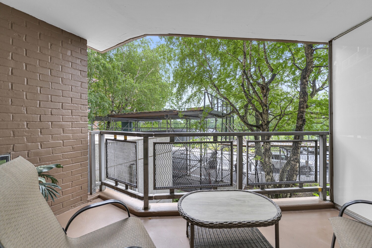 5800 Arlington Avenue, Unit 2R Bronx, NY 10471 - Photo 5 of 19 a balcony with table and chairs